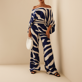 Elegante off-shoulder Sommeroutfit mit weitem Hosen | Celeste-Genf Boutique